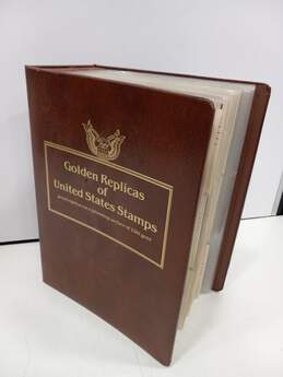 Binder of Golden Replicas of United States Stamps