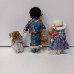 Vintage Trio of Porcelain Fashion Dolls alternative image