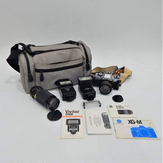 Minolta XG-M SLR 35mm Film Camera w/ 2 Lens, 2 Flash, Manuals & Bag image number 1