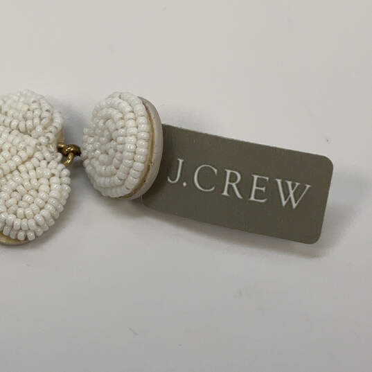 Designer J. Crew Gold-Tone White Beaded Tassel Classic Dangle Earrings image number 4