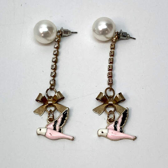 Designer Betsey Johnson Two-Tone Rhinestone Pink Bird Bow Dangle Earrings image number 1