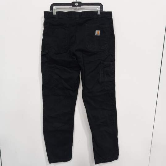 Men’s Carhartt Relaxed Fit Cargo Jeans Sz 36x34 image number 2