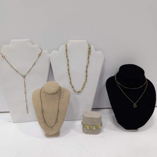 Bundle of faux gold and green tones costume jewelry image number 1