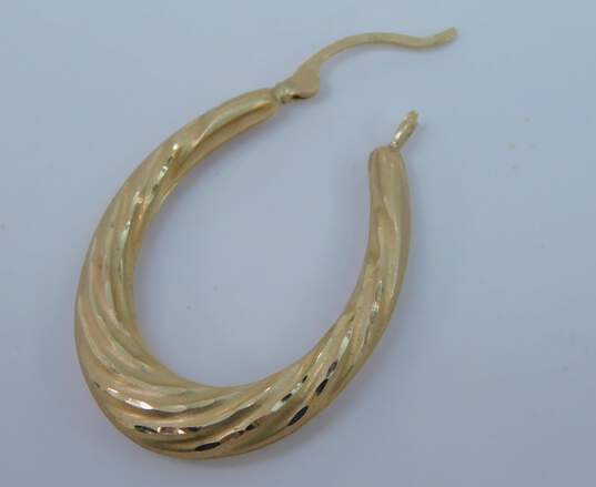 14K Gold Satin Etched Twisted Puffed Oblong Hoop Earrings 2.8g image number 3