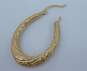 14K Gold Satin Etched Twisted Puffed Oblong Hoop Earrings 2.8g image number 3