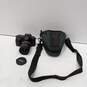 Nikon N50 35-80mm Film Camera w/ Lens & Soft Green Travel Case image number 1