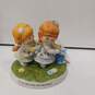 Pair of Figurines Helping Hands & Wonder Of Nature In Box image number 5