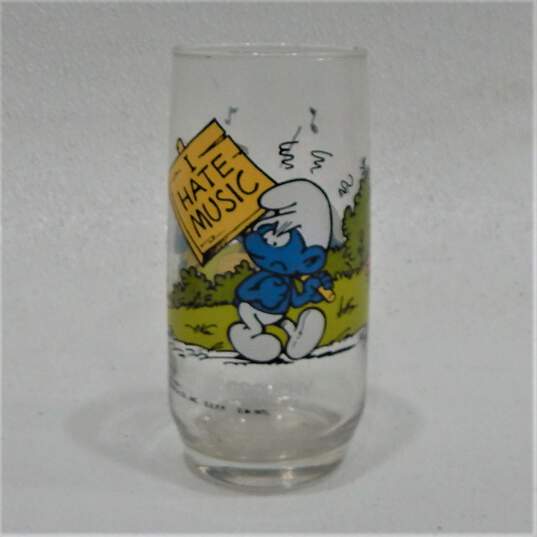 VTG 1970s-80s Collectible Drinking Glasses Smurfs Care Bears Shazam Six Million Dollar Man image number 4