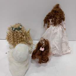 Four Assorted Porcelain Dolls alternative image