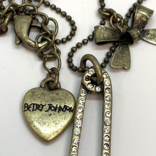 Designer Betsey Johnson Gold-Tone Rhinestone Bow Pin Charm Necklace image number 4