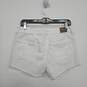 American Eagle White Distressed Cut Off Shorts image number 2