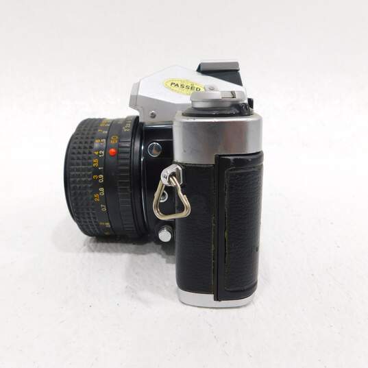 Minolta XG-9 35mm SLR Film Camera w/ 2 Lenses, Flash & Neck Strap image number 5