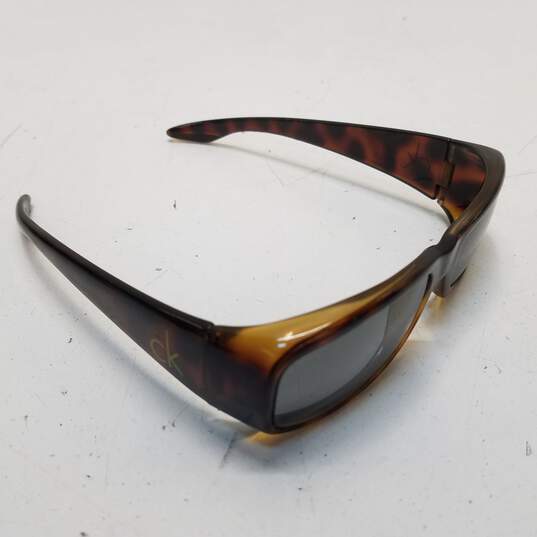 Calvin Klein Brown Tortoise Shell Rectangular Sunglasses image number 5