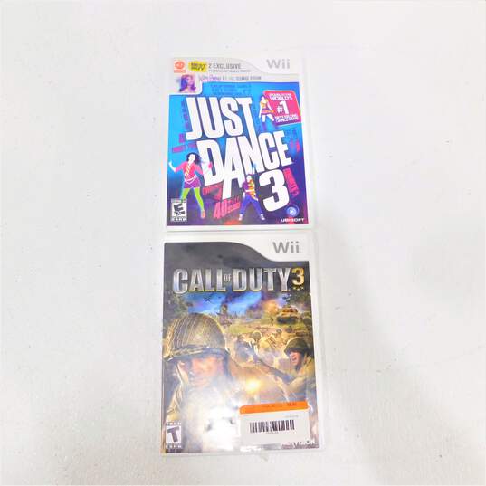 Nintendo Wii With Two Games Call Of Duty Three image number 7