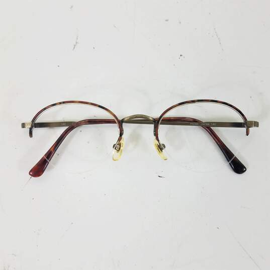 Calvin Klein Brown Circular Eyeglasses Frame image number 1