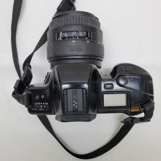 Minolta Maxxum 3xi AF 35mm Film SLR Black Body w AF 35-80 Power Zoom image number 4