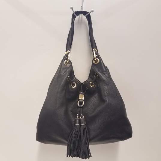 Buy the Michael Kors Camden Pebble Leather Drawstring Shoulder Bag Black