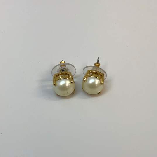Designer Kate Spade New York Gold-Tone Cream Pearl Stud Earrings image number 2