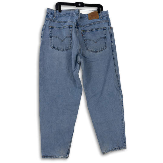 Mens Blue 560 Medium Wash Denim Tapered Jeans Size 42X30 image number 4