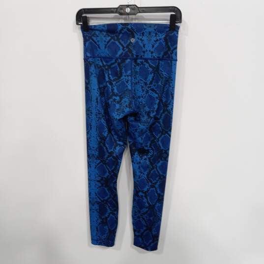 Buy the Lululemon Women's Blue Snake Pattern Yoga Pants Size 6