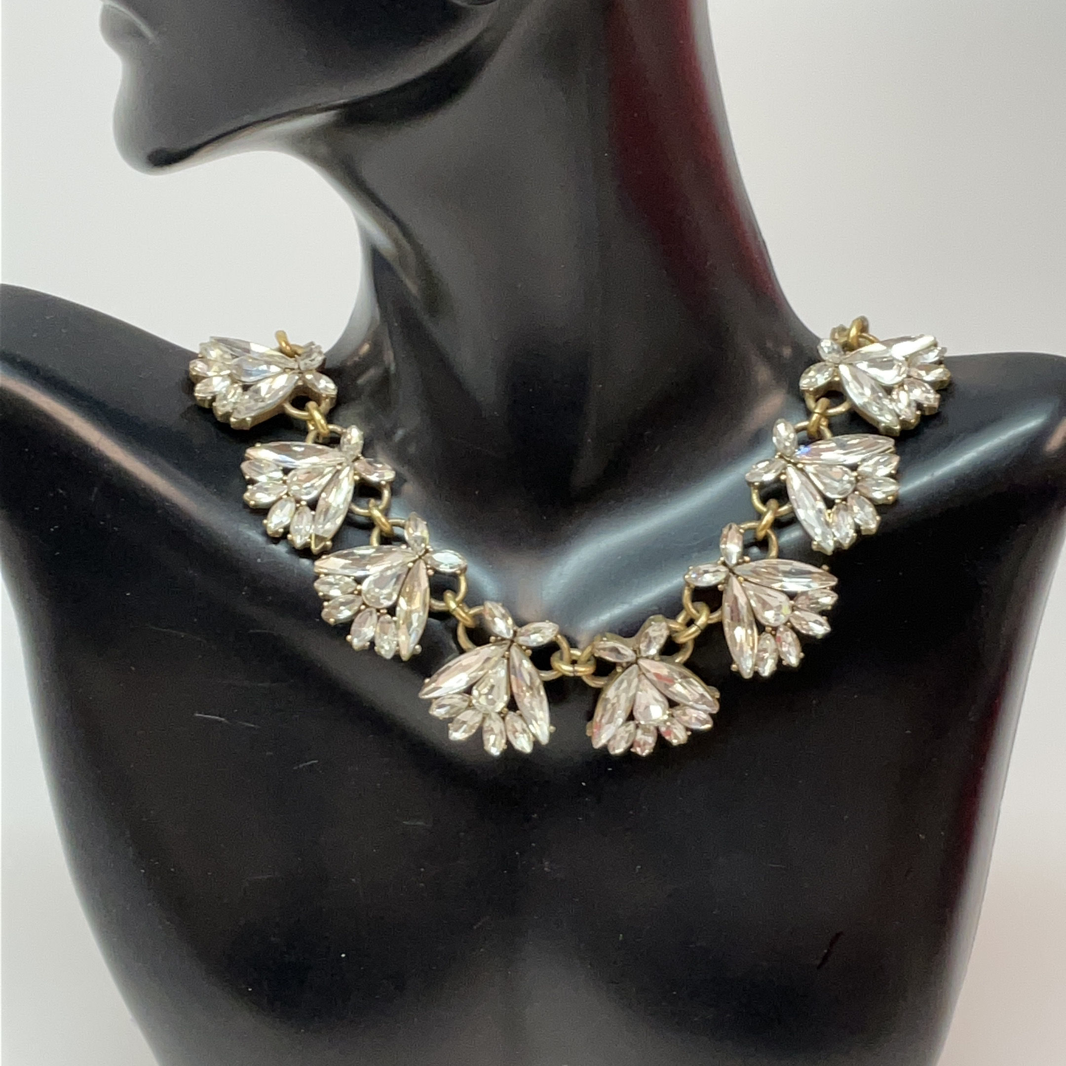J.Crew rhinestone necklace with gold tones. 15” long and attends almost 2”.  EUC | Rhinestone necklace, Gold tones, Rhinestone