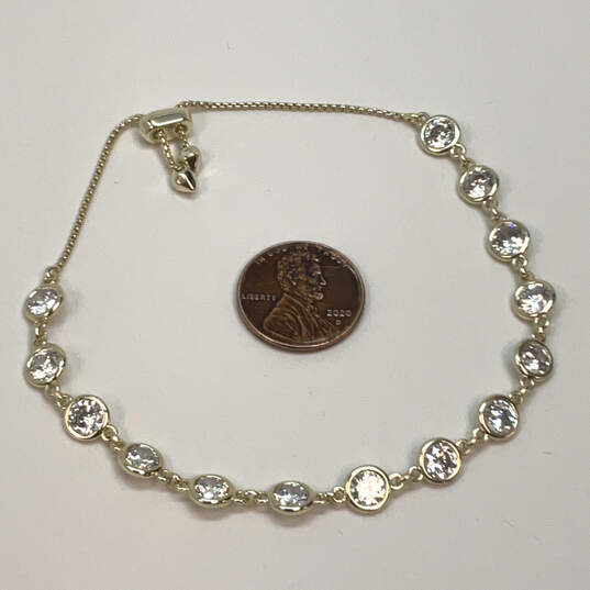 Designer Kendra Scott Gold-Tone Clear Crystal Cut Stone Chain Bracelet image number 2