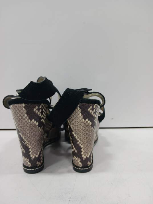 Women's Michael Kors Black Suede Snake Print Strappy Wedge Size 10M image number 1