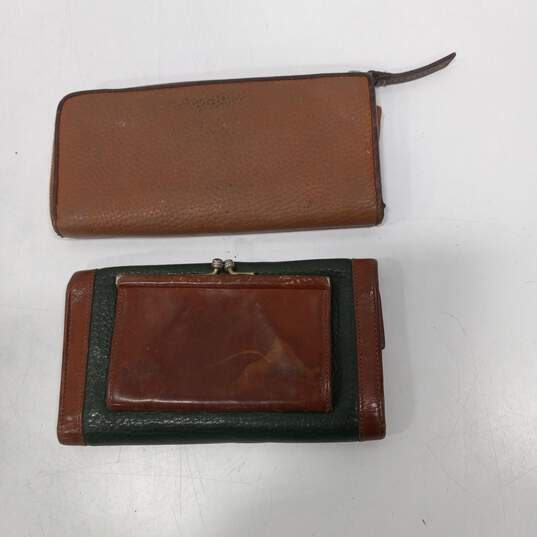 Pair of Dooney and Bourke Leather Unisex Wallets image number 2