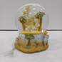 Enesco Precious Moments Away in a Manger Musical Snowglobe image number 3