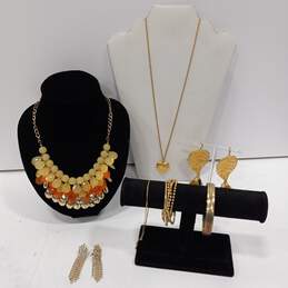 Bundle of faux gold and orange costume jewelry