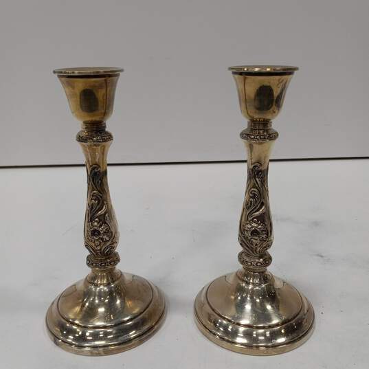 PAIR OF SILVERPLATED CANDLE STICKS image number 3