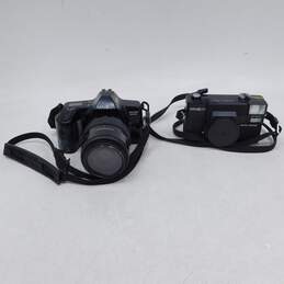 Minolta Brand Maxxum 3000i and Hi-Matic AF2 Model 35mm Film Cameras (Set of 2)