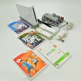 Nintendo Wii With 4 Games, 2 Controllers, 2 Nunchucks, and 1 Stand