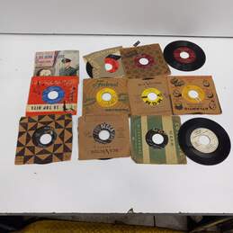 Bundle Of 12 Assorted 7in Vinyl Records
