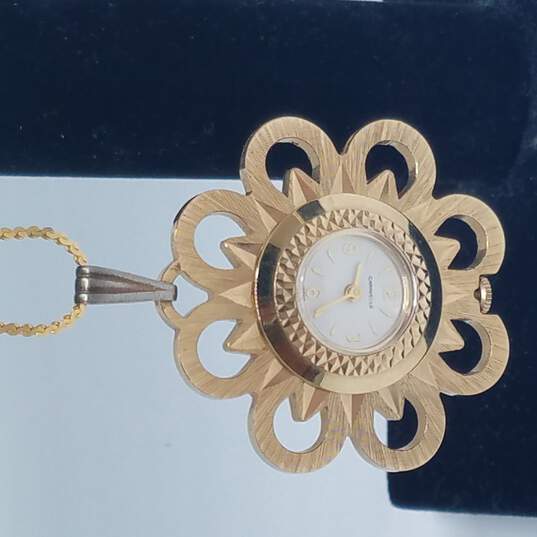 Caravelle Gold Tone Flower On Chain Vintage Automatic Manual Wind Pendant Watch image number 1