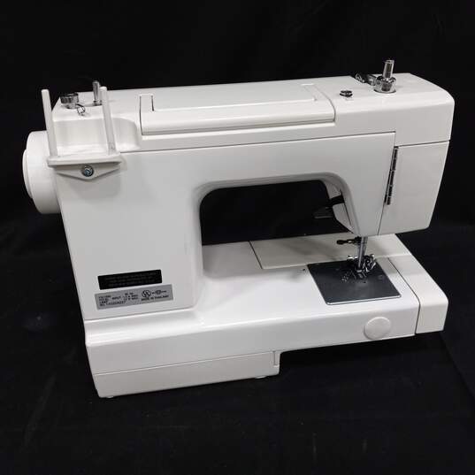 Buy the Dual Sew Sew & Surge Sewing Machine In Carry Bag | GoodwillFinds