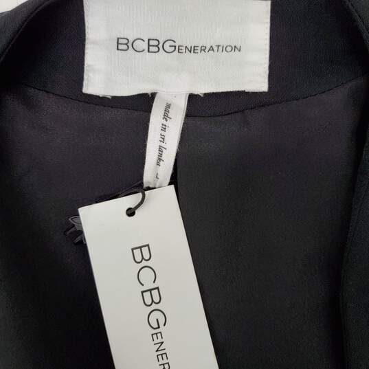NWT BCBG Generation WM's Black Chiffon Flounced Blouse Size L image number 3