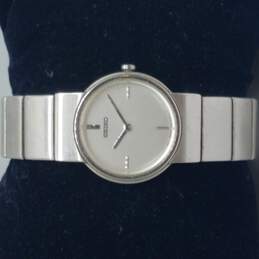 Seiko 7N00-6D68 Rare All Silver Tone Circular Vintage 90s Thin Minimalist Watch alternative image
