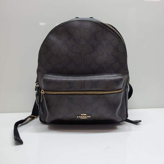 AUTHENITCATED COACH DARK BROWN SIGNATURE LEATHER BACKPACK 11.5x10x7 image number 1