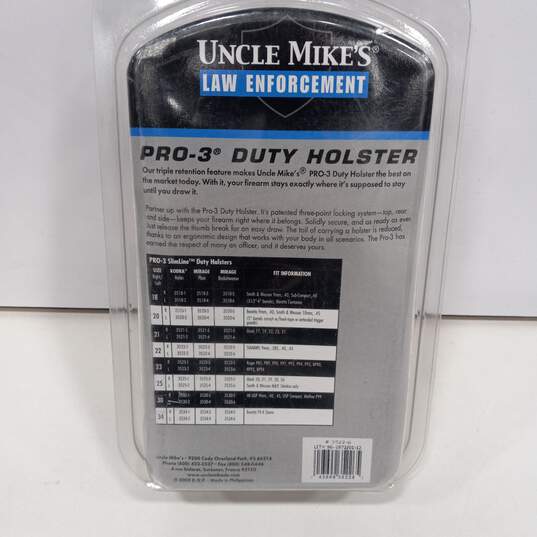 Uncle Mike's Law Enforcement Pro -3 Duty Holster Size 22 Left Hand image number 10