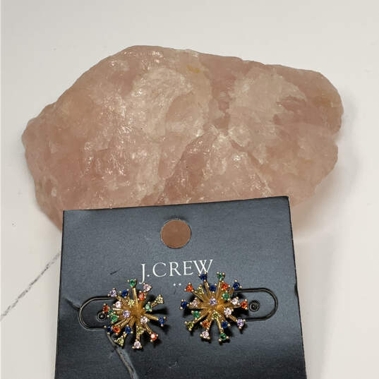 Designer J. Crew Gold-Tone Snowflake Multicolor Rhinestone Stud Earrings image number 1