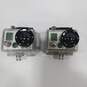 Pair Of GoPro Hero 2 Action Cameras & Accessories in Hard Case image number 3