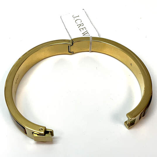 Designer J. Crew Gold-Tone Silver Fashionable Tortoise Bangle Bracelet image number 4