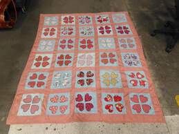 Pink Heart Patterned Quilt