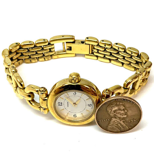 Designer Coach W006 Gold-Tone Stainless Steel Round Dial Analog Wristwatch image number 2