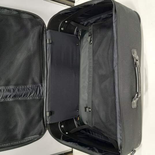 Rolling Black Travel Suitcase image number 4