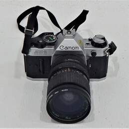 Canon AE-1 Program 35mm SLR Film Camera w/ 28-70mm Lens & Manual alternative image