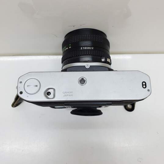 UNTESTED Sliver/Black Canon AE-1 Film Camera Bundle with 3 lenses, Flash & Bag image number 5