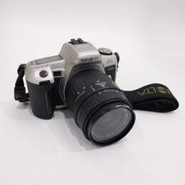 Minolta XTsi 35mm SLR Film Camera w/ Sigma 28-80mm Lens & Neck Strap