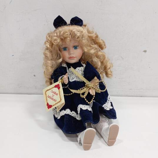 Collector's Choice Musical Porcelain Doll NWT image number 1